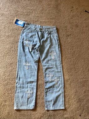 Light Blue Denim Jeans with Cross Appliqués